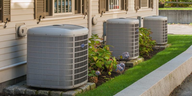 3 HVAC units outside of apartment homes